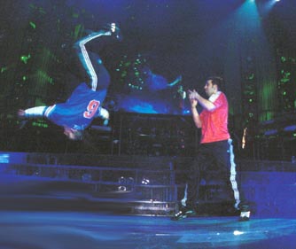 Chris doing a backflip with some help from Joey!